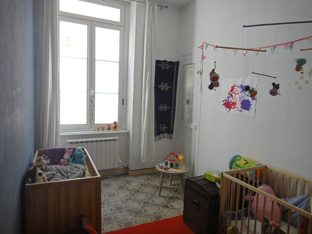 A vendre Croix Rousse : rez de jardin avec terrasse